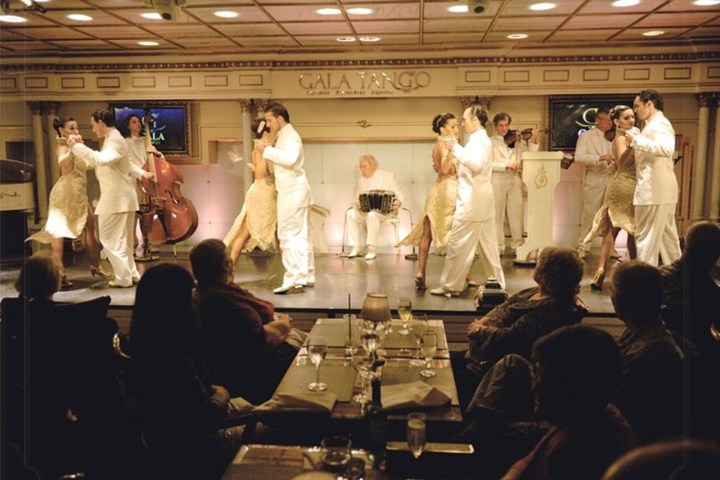 a group of people standing in a room