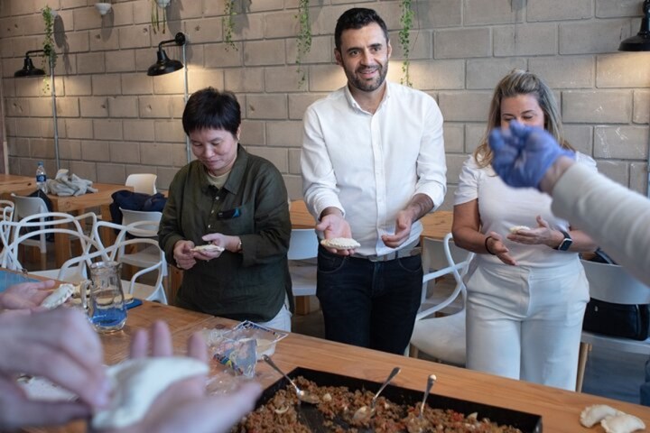 a group of people sitting at a table